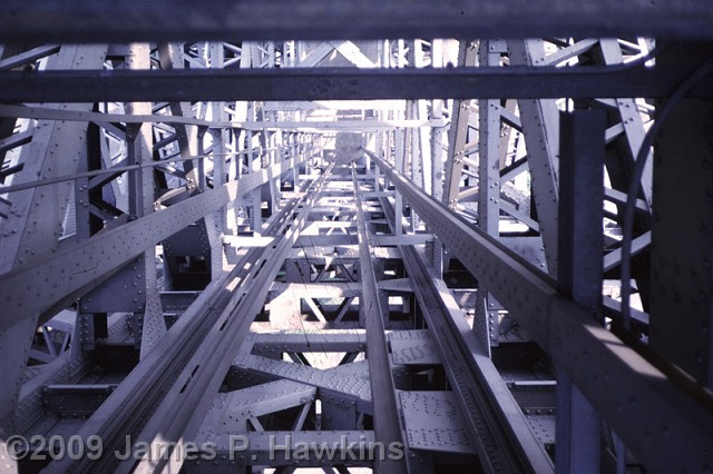 slides/07 - YAS62-63_0001.jpg bridges George Washington Bridge Looking up through the tower in 1963. This view is now blocked off by a screen as the next slides will show. Camera: Yashica 35mm Rangefinder Film: Anscochrome Slide film